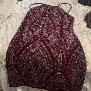 Beautiful sparkly burgundy dress with glitter you’ll light up a room!! Size 9/10